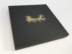 Cassette tape and CD box set with gold foil print lid and custom foam insert