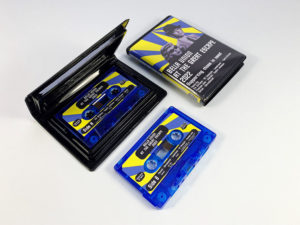 Transparent blue cassette shells with sticker printing in black rave case
