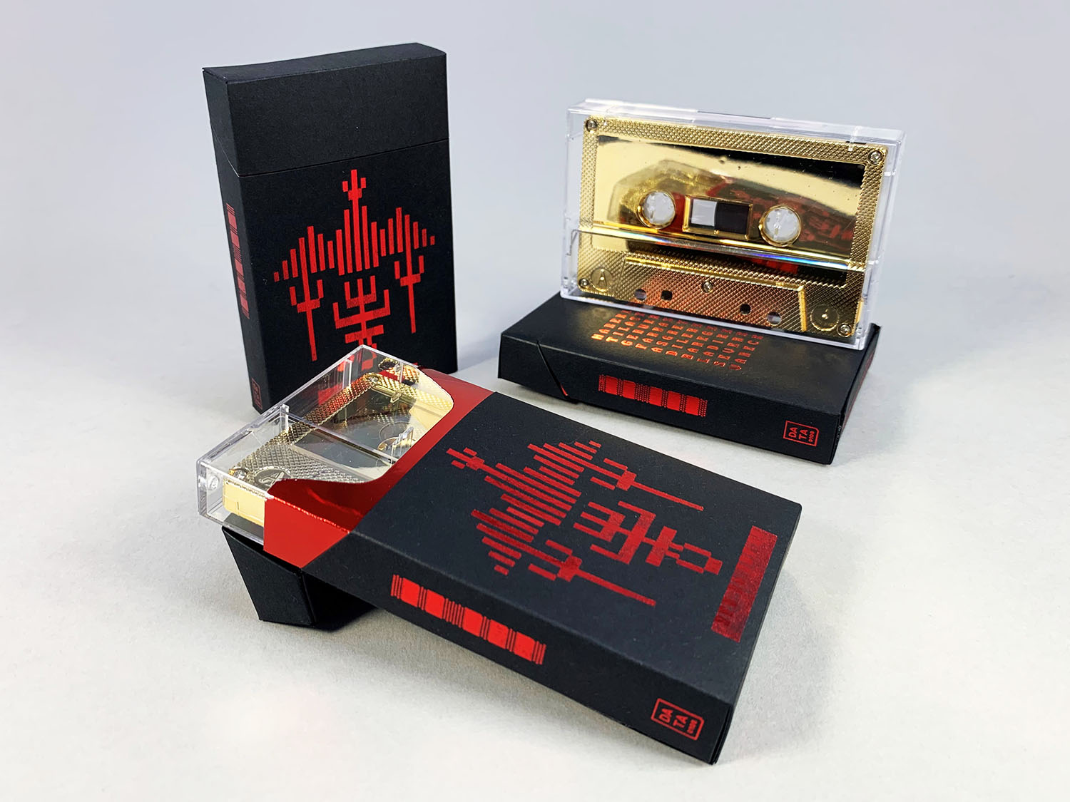 Cassette tapes in cigarette pack cases