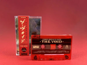 Transparent red tapes with gold on-body printing in cases with J-cards and obi strips