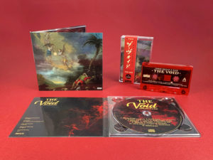 A matching set of transparent red cassettes with gold on-body print and CDs in 4 page digipaks