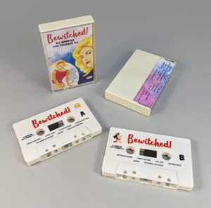 White cassette shells with full colour on-body print in cream backed cases with full colour 3 panel J-cards