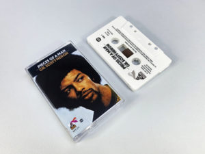 White cassette shells with black on-body print in clear cases with full colour 3 panel J-cards