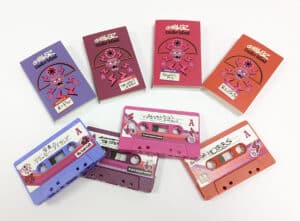 Gorillaz Cracker Island cassette tapes in printed O-cards