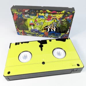 King Gizzard Live at Bonnaroo 2022 VHS tapes with on-body base and top printing on the tapes