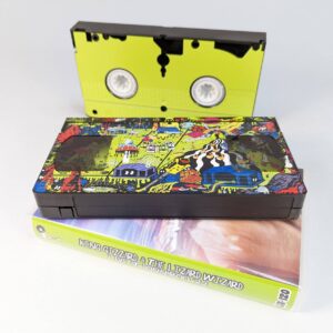 King Gizzard Live at Bonnaroo 2022 VHS tapes with on-body base and top printing on the tapes