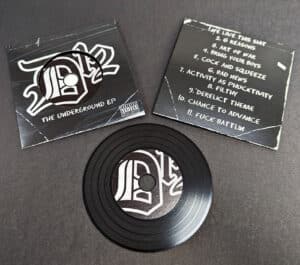 Black vinyl CDs in record-style 2 page wallets