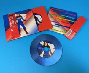 Glass mastered custom blue vinyl-style CDs in red record-style inner wallets, printed oversized wallets and obi strips