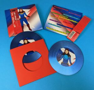 Glass mastered custom blue vinyl-style CDs in red record-style inner wallets, printed oversized wallets and obi strips