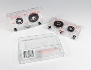 Clear prison tapes with red on-body printing and tape cases with white, black and red on-body printing