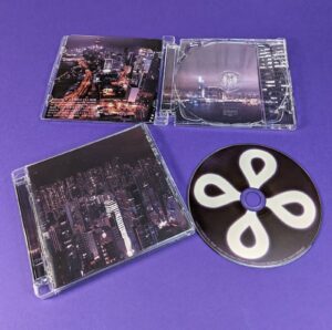 SACD jewel cases with 4 page booklet inserts, rear tray inlay and outer obi strips