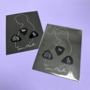 Triple black guitar pick set on matt laminated printed black cards, packed in clear cellophane wraps