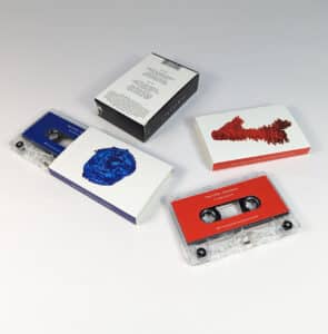 Double clear cassette tapes in O-cards with a custom double O-card slipcase